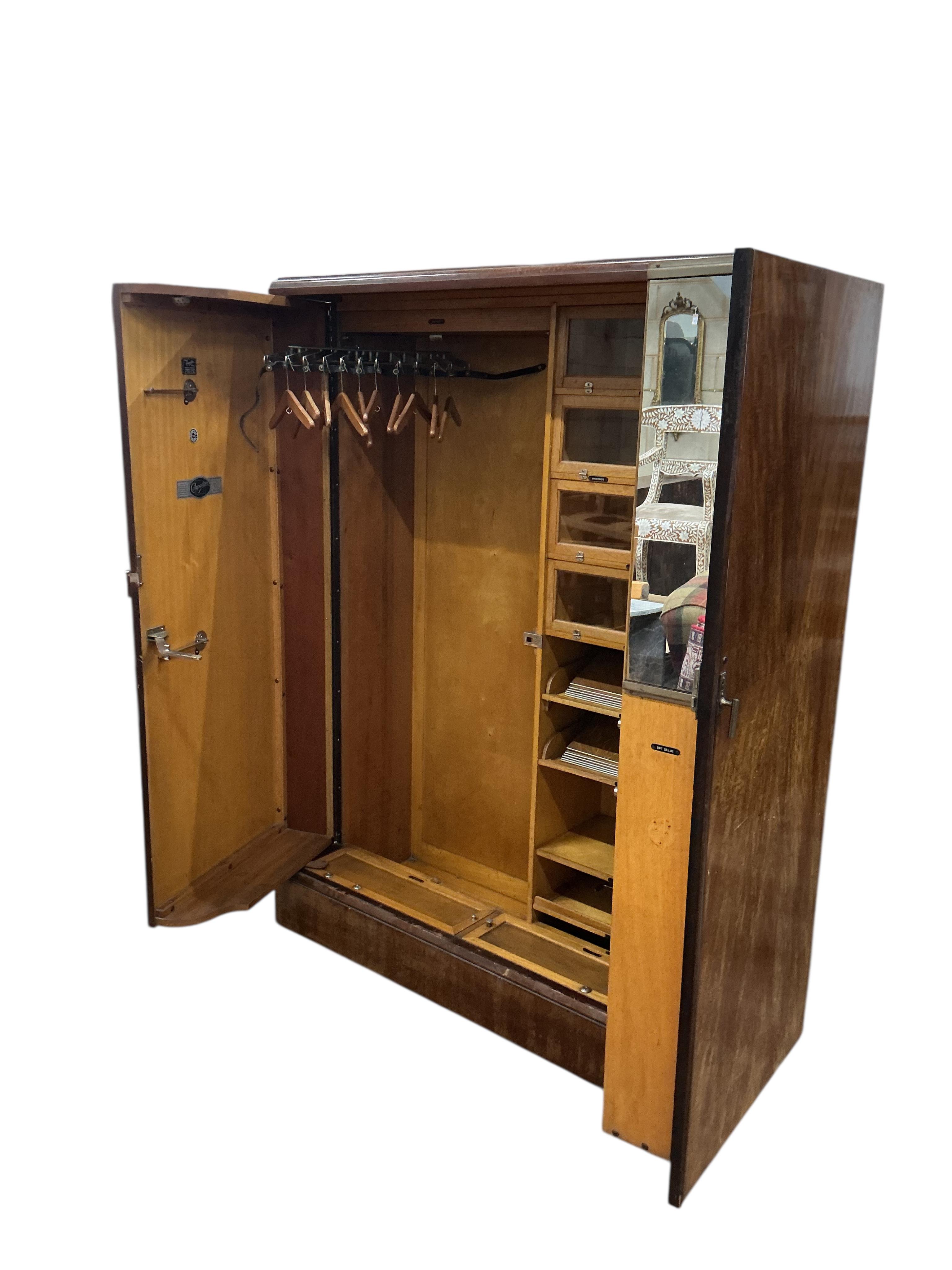 An early 20th century mahogany Patent Compactum wardrobe, width 120cm, depth 52cm, height 173cm
